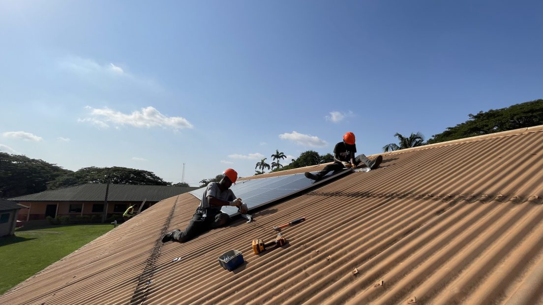 Solar panels are being installed on the roof